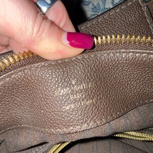 Louis Vuitton Monogram Empreinte Audacieuse shoulder bag in dark brown